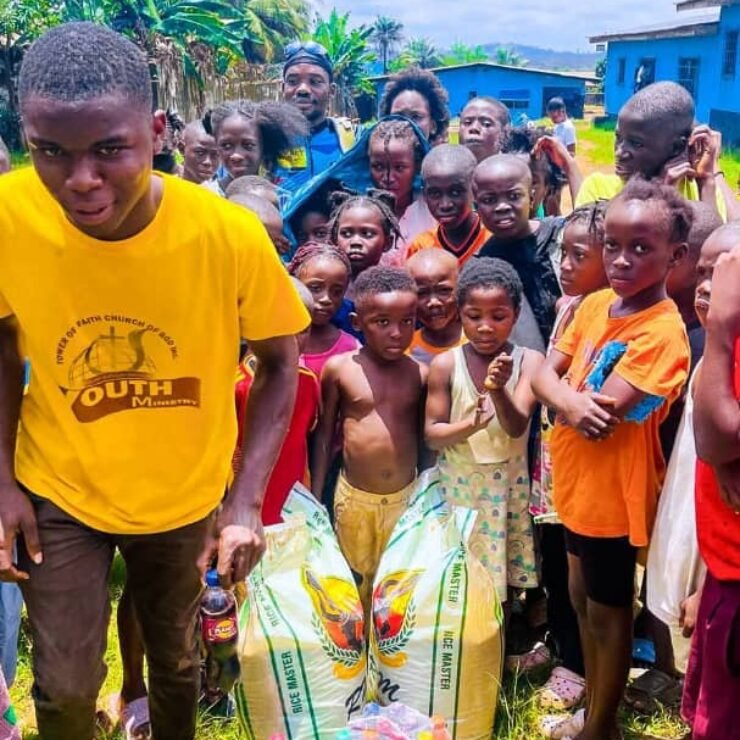Emmiwuks visiting a local community during his charity ride to raise awareness for internally displaced children