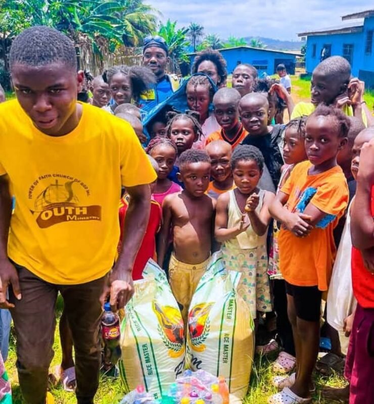Emmiwuks visiting a local community during his charity ride to raise awareness for internally displaced children