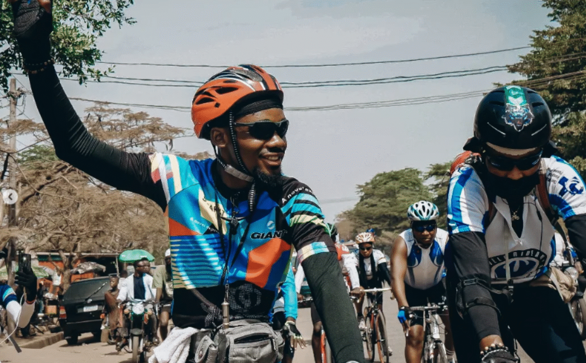 Emmiwuks advocating for children’s welfare while traveling by bicycle across Africa