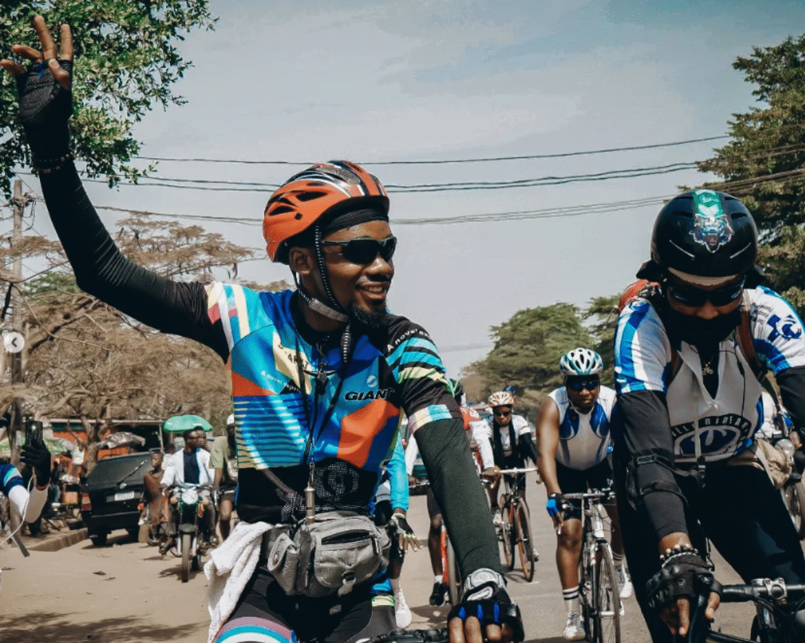 Emmiwuks advocating for children’s welfare while traveling by bicycle across Africa